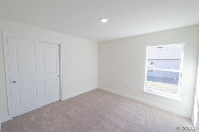 view of carpeted spare room