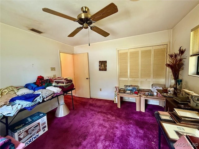 2750 W Mustang Blvd, Beverly Hills, FL 34465 - bedroom with carpet flooring, a ceiling fan, and a closet