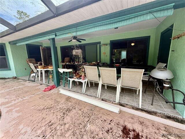 2750 W Mustang Blvd, Beverly Hills, FL 34465 - view of patio / terrace with outdoor dining area and ceiling fan