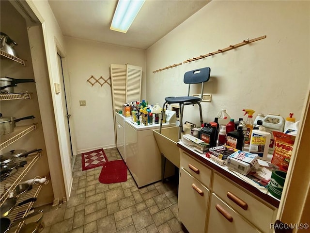 2750 W Mustang Blvd, Beverly Hills, FL 34465 - laundry room featuring washing machine and clothes dryer and brick patterned floors