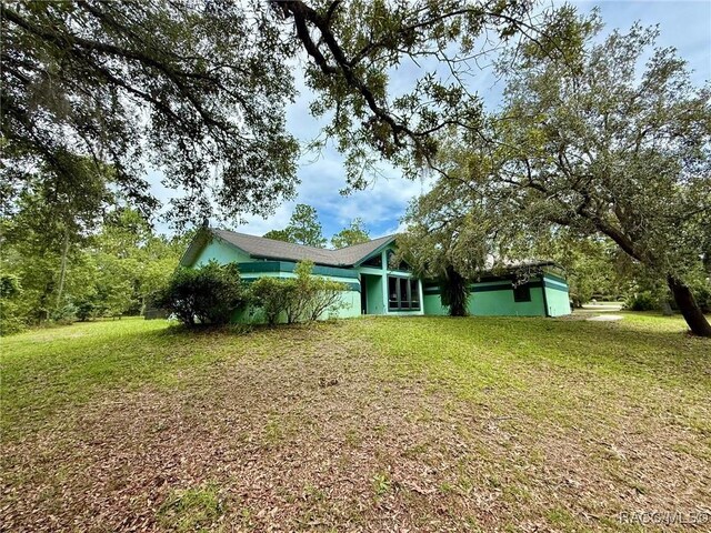 2750 W Mustang Blvd, Beverly Hills, FL 34465 - view of grassy yard