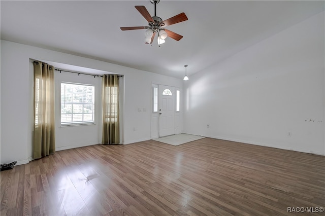 entrance foyer with light hardwood / wood-style flooring and ceiling fan