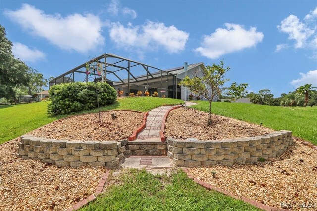 391 E Falconry Ct, Hernando, FL 34442 - view of grassy yard featuring glass enclosure