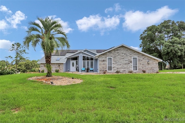 391 E Falconry Ct, Hernando, FL 34442 - back of property with solar panels and a yard