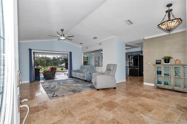 391 E Falconry Ct, Hernando, FL 34442 - living room with a ceiling fan, stone tile floors, and lofted ceiling
