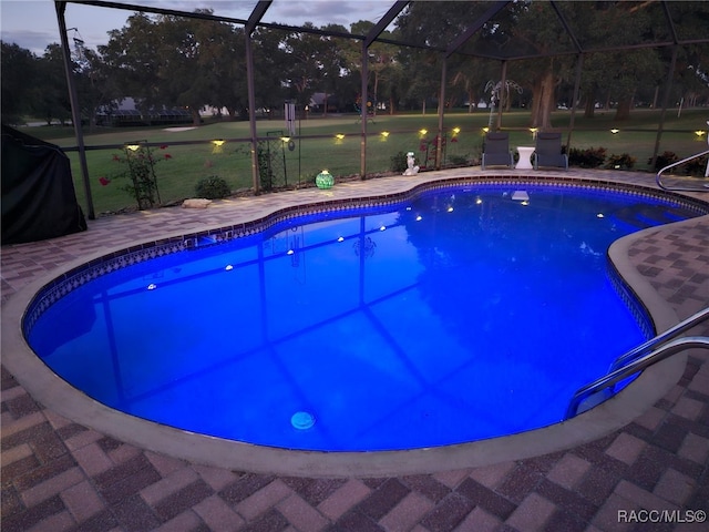 391 E Falconry Ct, Hernando, FL 34442 - outdoor pool featuring a patio area and glass enclosure
