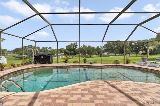 391 E Falconry Ct, Hernando, FL 34442 - swimming pool featuring a patio area, a yard, a lanai, and area for grilling