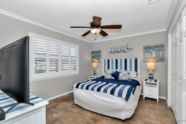 391 E Falconry Ct, Hernando, FL 34442 - bedroom featuring a closet, ornamental molding, stone finish floors, a textured ceiling, and a ceiling fan