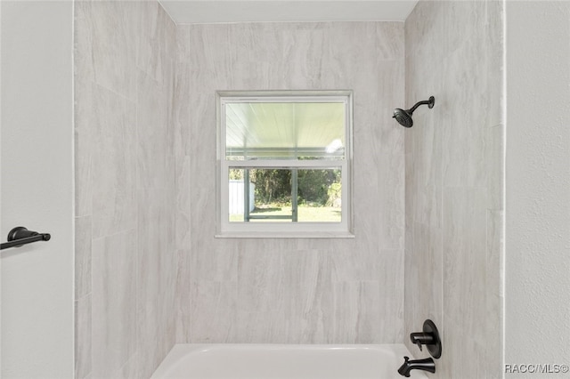 bathroom featuring bathing tub / shower combination