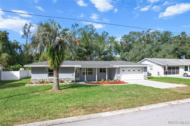 ranch-style house with a front lawn and a garage