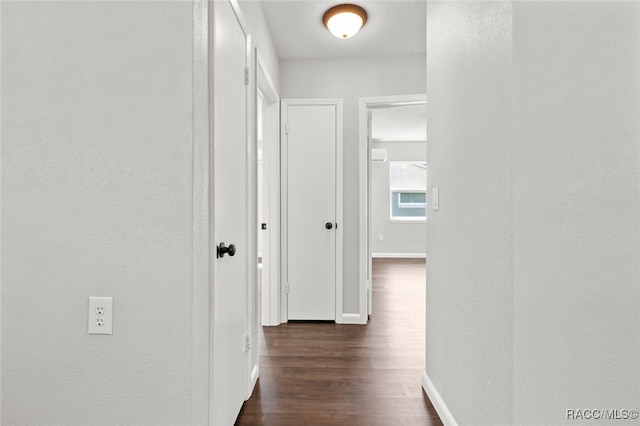 hall featuring dark hardwood / wood-style floors