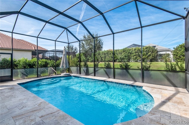 view of pool with a lanai