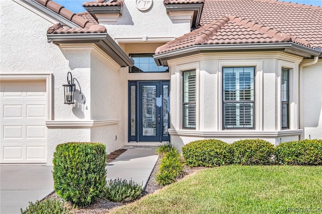 property entrance featuring a garage