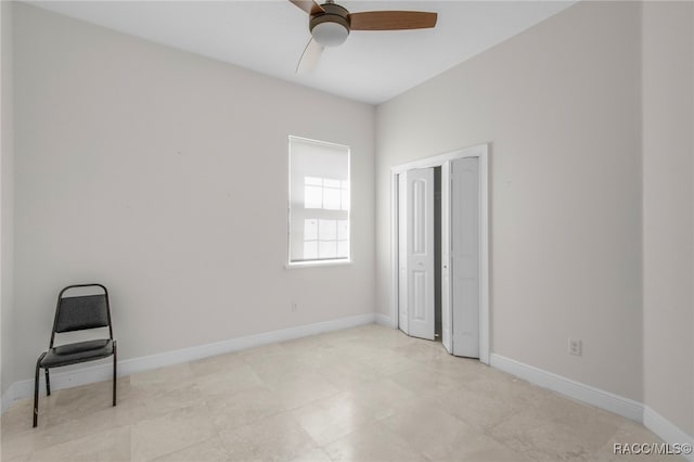 unfurnished room with ceiling fan