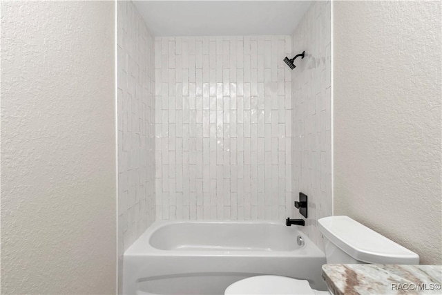 bathroom with toilet and shower / bath combination