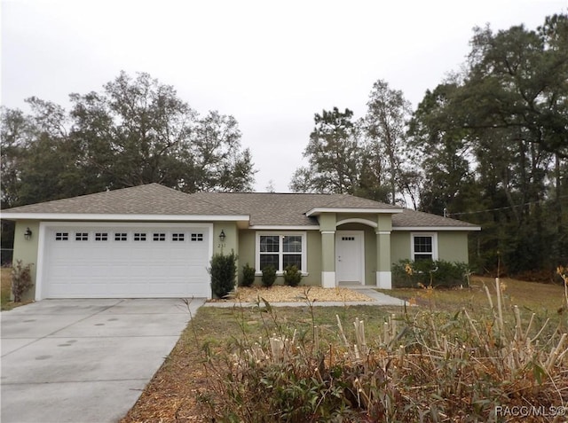 ranch-style home with a garage