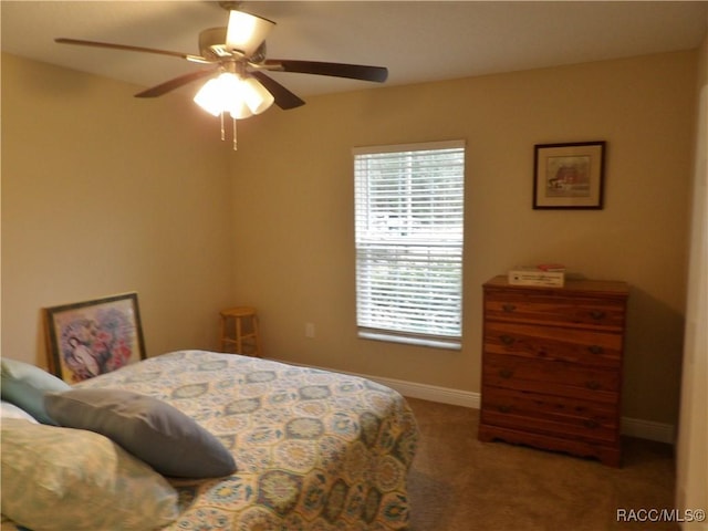 bedroom featuring carpet floors and ceiling fan