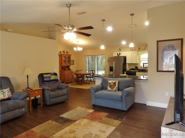 living room featuring dark wood-type flooring, ceiling fan, and high vaulted ceiling