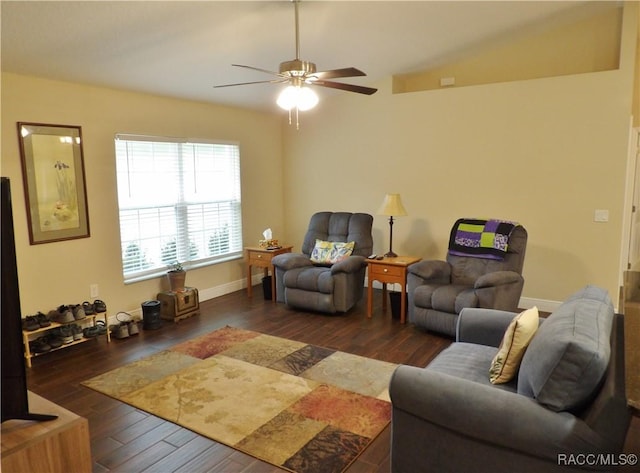 living room featuring dark hardwood / wood-style floors and ceiling fan