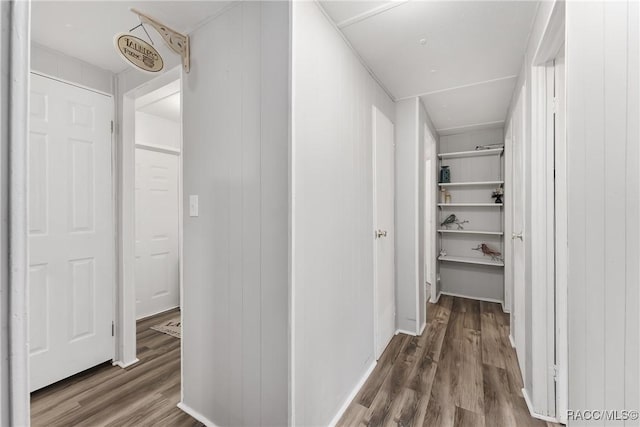 hallway with wood finished floors