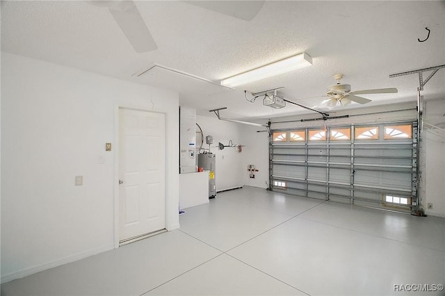 garage with electric water heater, ceiling fan, and a garage door opener