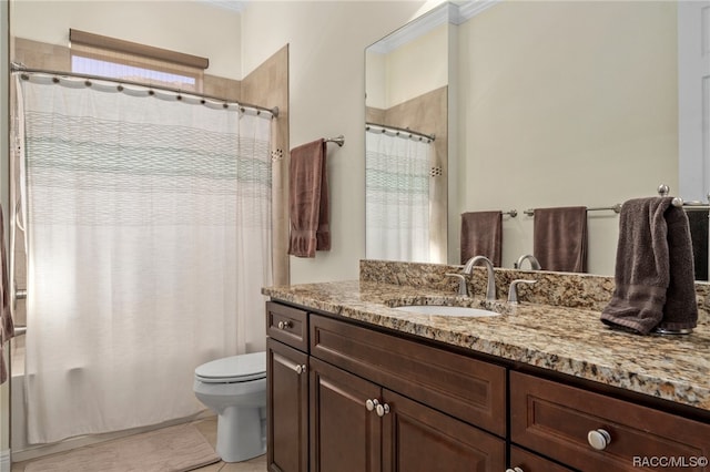 full bathroom with tile patterned floors, vanity, shower / tub combo, and toilet