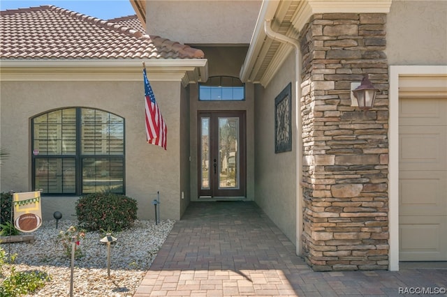 doorway to property featuring french doors