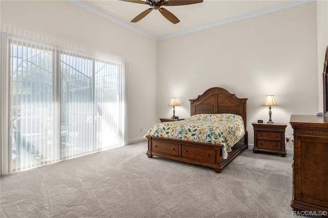 bedroom with ceiling fan, ornamental molding, and light carpet