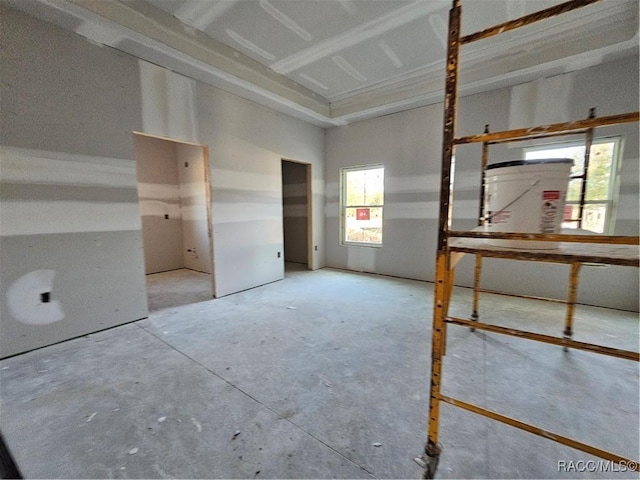 unfurnished bedroom featuring concrete flooring