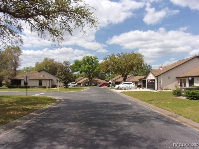 6337 W Lexington Dr, Crystal River, FL 34429 - view of road with a residential view and curbs