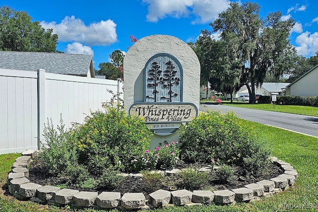 view of community sign