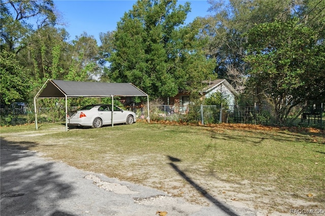 view of yard featuring a carport