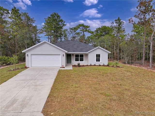 single story home featuring a front yard and a garage