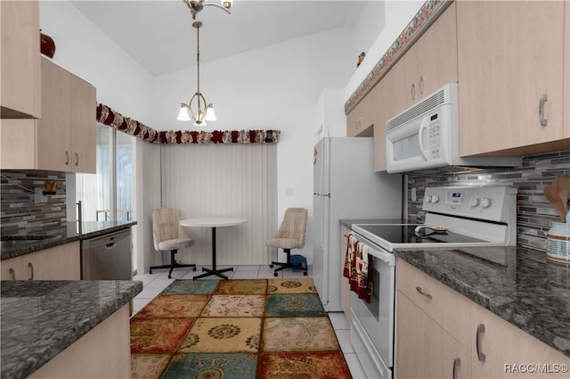 kitchen with lofted ceiling, white appliances, hanging light fixtures, light tile patterned flooring, and light brown cabinets