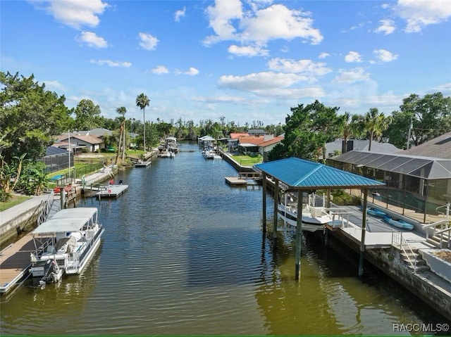 3945 N Timucua Pt, Crystal River, FL 34428 - view of dock featuring boat lift and a water view