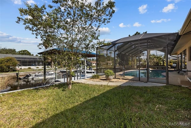 3945 N Timucua Pt, Crystal River, FL 34428 - view of yard with glass enclosure, a patio, and an outdoor pool