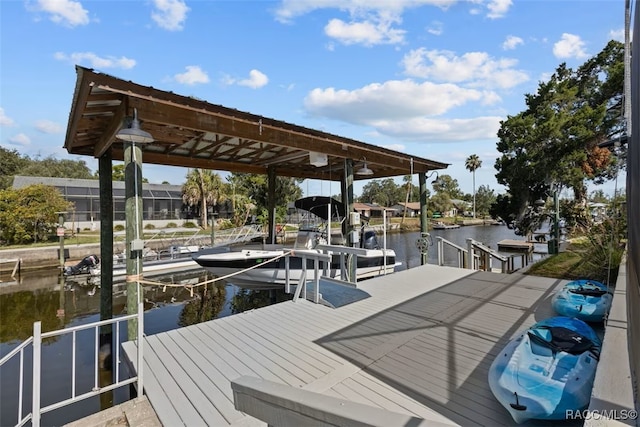 3945 N Timucua Pt, Crystal River, FL 34428 - dock area featuring a water view and boat lift