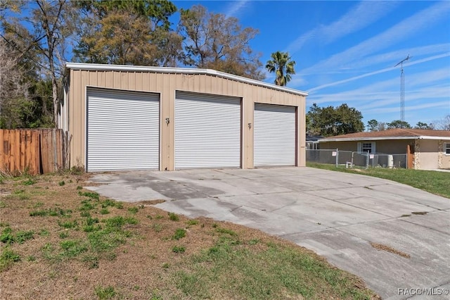 detached garage with fence