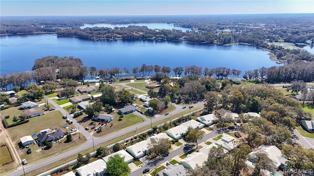 birds eye view of property with a residential view and a water view