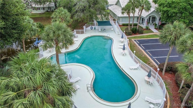 community pool featuring a patio area