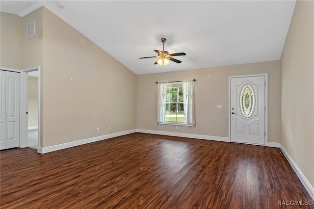 entrance foyer with ceiling fan, dark hardwood / wood-style flooring, and lofted ceiling