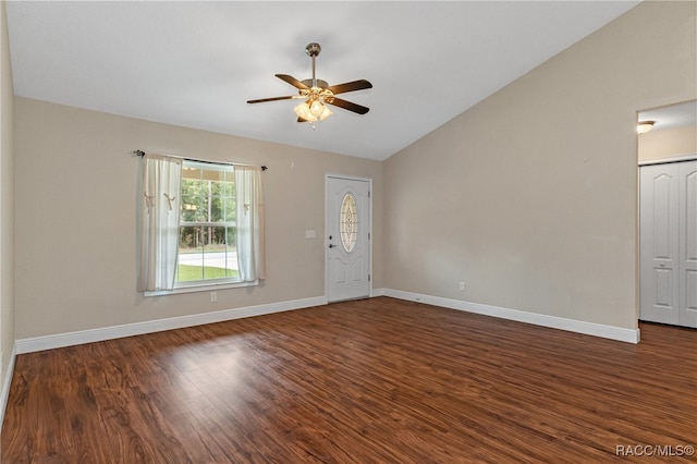 interior space featuring ceiling fan, dark hardwood / wood-style flooring, and lofted ceiling