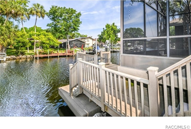 dock area featuring a water view