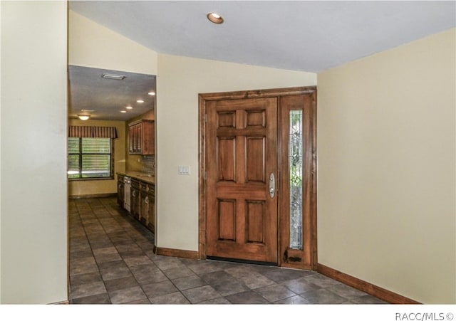 foyer entrance with vaulted ceiling