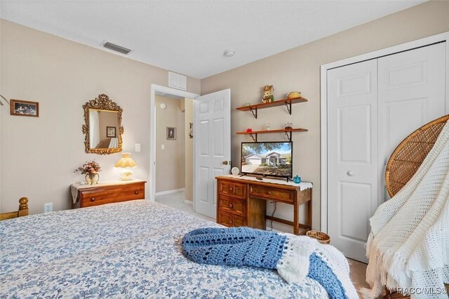 1923 W Mcneal Dr, Citrus Springs, FL 34434 - carpeted bedroom featuring baseboards
