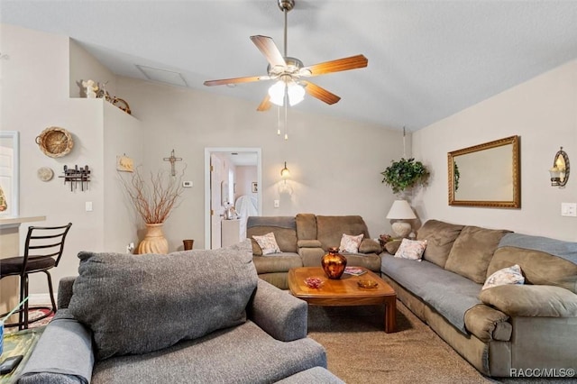 carpeted living room with vaulted ceiling and ceiling fan