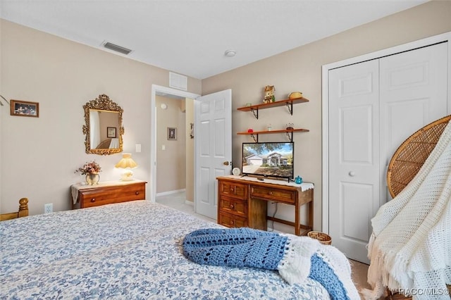 carpeted bedroom with a closet