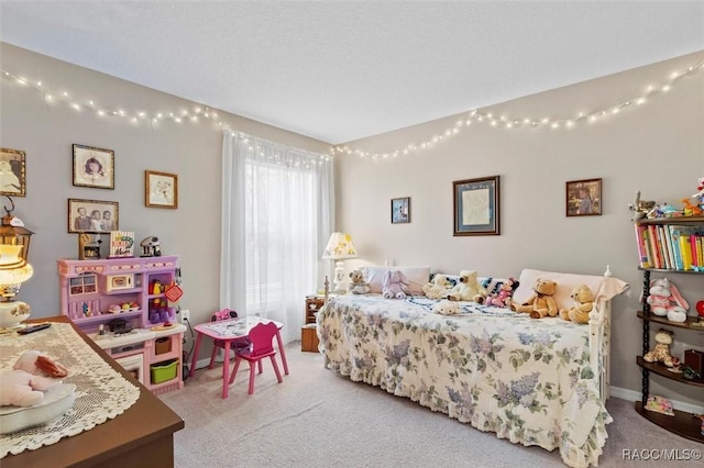 bedroom featuring light carpet