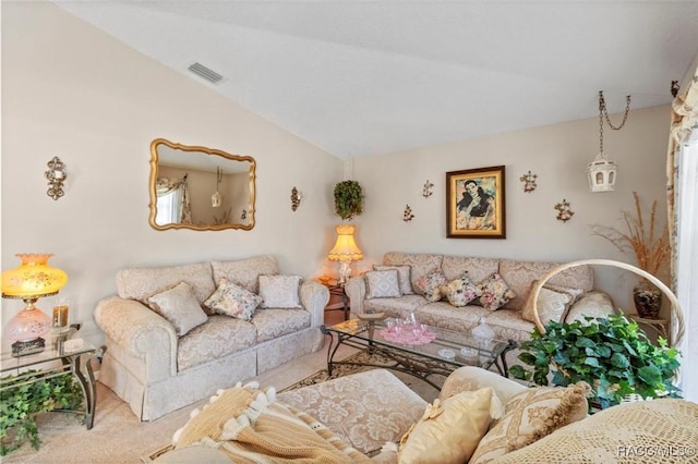 living room featuring light carpet and vaulted ceiling