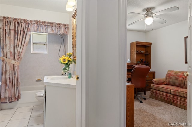 full bathroom featuring shower / bath combo, tile patterned floors, vanity, ceiling fan, and toilet